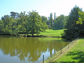 Pond behind Chteau des Ducs de Mortemart.   Copyright Cold Spring Press.  All rights reserved.