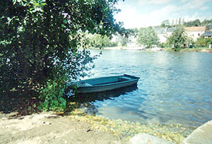 Boat on River Sarthe, Solesmes.  Copyright 1999-present.  Cold Spring Press.  All rights reserved.