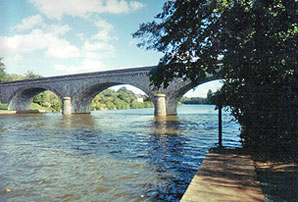 Bridge on River Sarthe, Solesmes.  Copyright 1999-present.  Cold Spring Press.  All rights reserved.