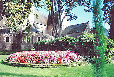 Church and garden, Solesmes.  Copyright 1999-present Cold Spring Press.  All rights reserved.